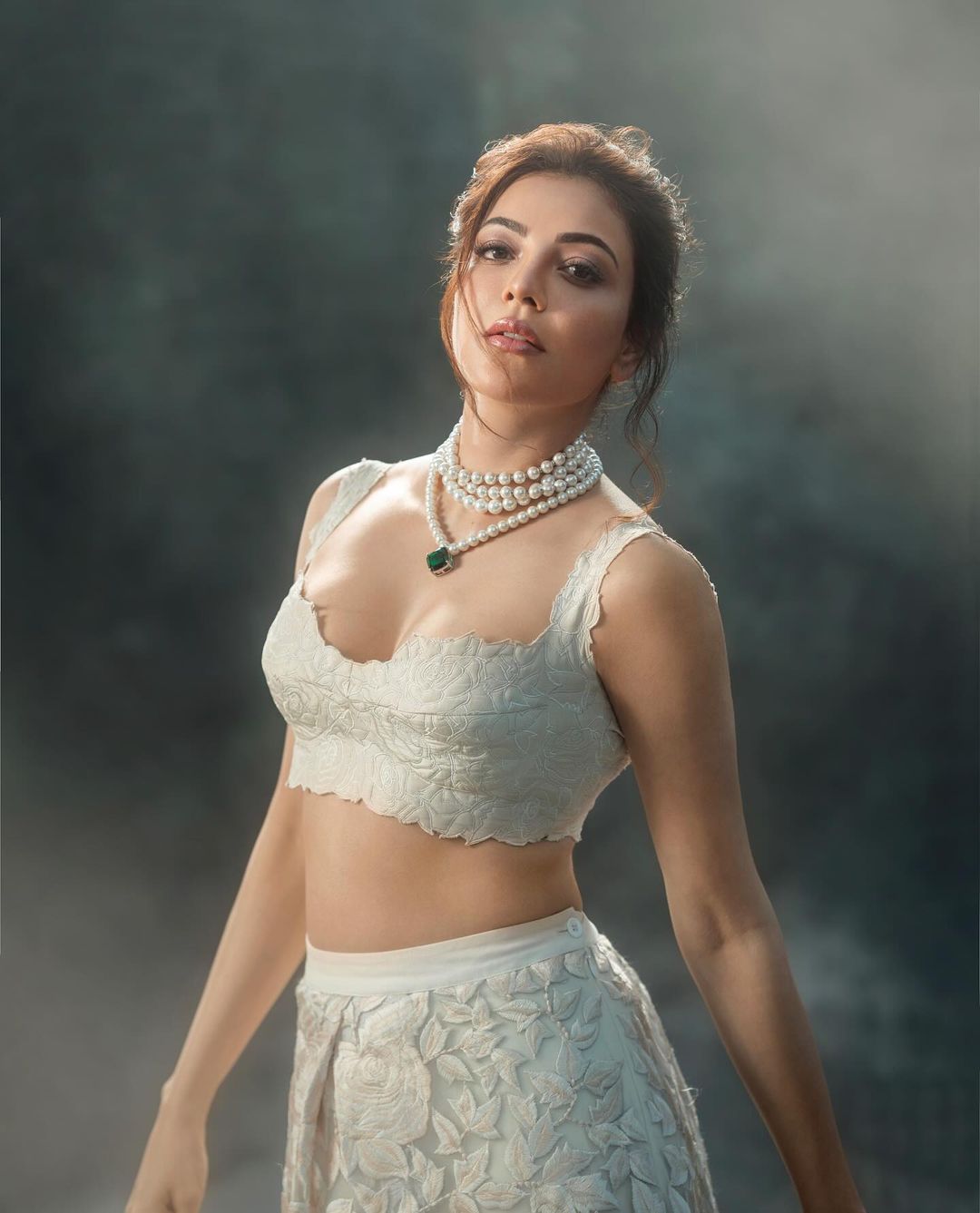 Indian Actress Kajal Aggarwal Stills in White Lehenga Choli